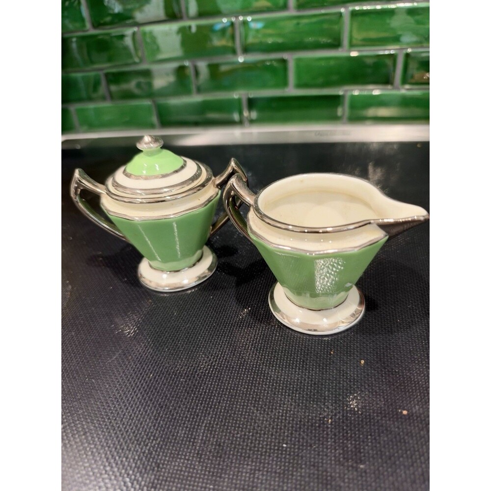 FRAUNFELTER CHINA 387 GREEN AND SILVER ART DECO CREAMER AND SUGAR SET
